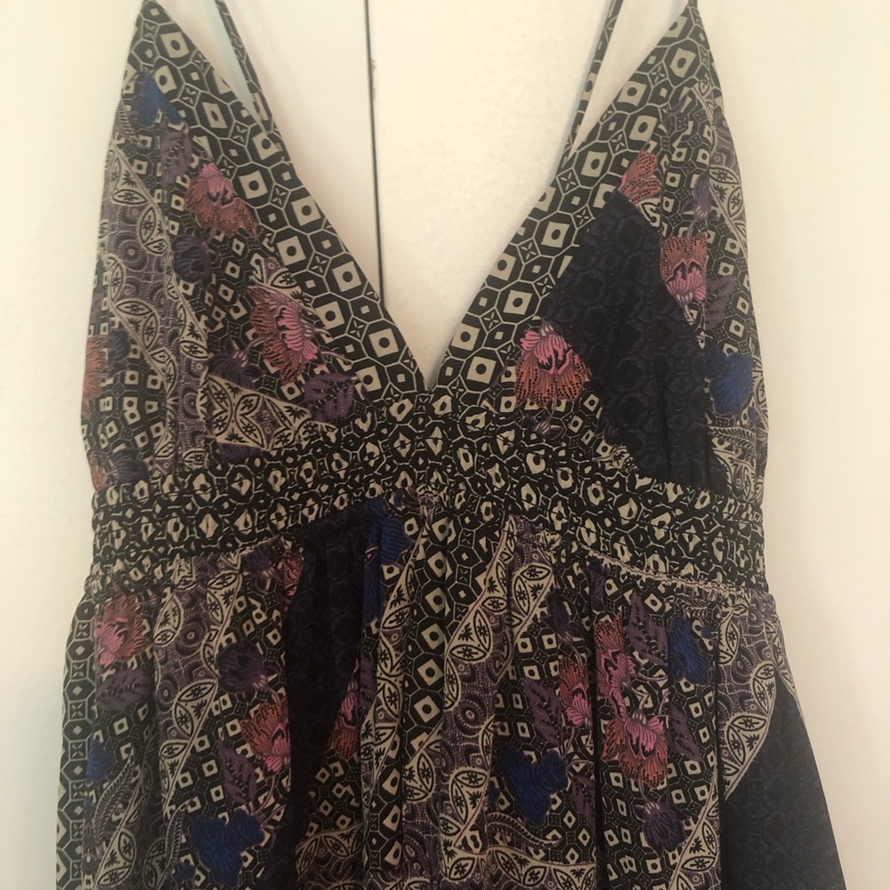 Black boho maxi dress with spaghetti adjustable straps that tie in back.